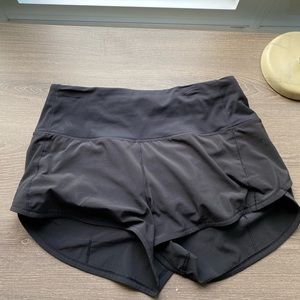 Selling new never worn lululemon speed up shorts. Size 6, black, 4”.